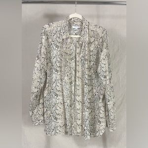 Women’s XL button down shirt.